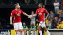 Ekspresi pemain MU, Marcus Rashford, setelah mencetak gol pertama ke gawang Watford dalam laga Premier League di Stadion Vicarage Road, Minggu (18/9/2016). (Action Images via Reuters/Andrew Couldridge)