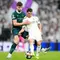 Ruben Dias mencoba merebut bola dari kaki Brahim Diaz di laga Real Madrid vs Manchester City, Kamis (12/3/2026) (AP Photo/Jose Breton)