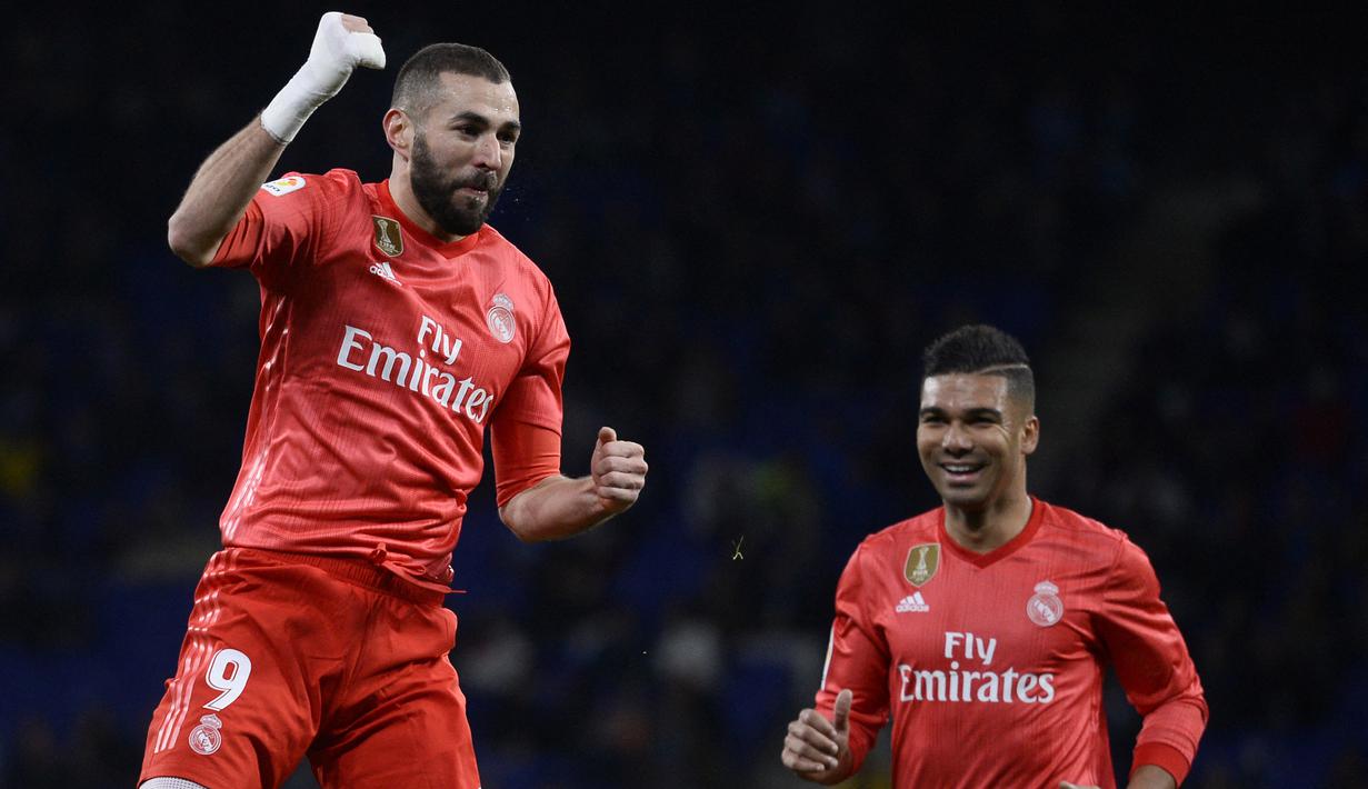 Pada pekan berikutnya alias dua pekan usai mengalami cedera, Karim Benzema sukses mencetak brace ke gawang Espanyol dalam kemenangan 4-2 Real Madrid di markas Espanyol. (AFP/Josep Lago)
