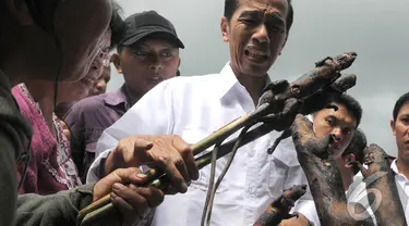 Capres PDIP Joko Widodo bersafari politik di Pasar Tomohon, Sulawesi Utara, Sabtu (10/5/2014) (Liputan6.com/Herman Zakharia).