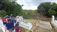 Tempat Pemakaman Umum (TPU) Kristen Simalingkar B, Kecamatan Medan Tuntungan, Kota Medan, Sumatera Utara (Sumut), longsor akibat tergerus arus sungai