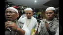 Ustadz kondang Arifin Ilham menyambangi Gedung Komisi Pemberantasan Korupsi (KPK), Jakarta, Selasa (27/1/2015).kehadiran Ustadz Arifin Ilham ke KPK sebagai agenda rutin memberikan ceramah kepada seluruh karyawan KPK. (Liputan6.com/Herman Zakharia)