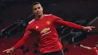 Mason Greenwood menjadi pencetak gol tunggal yang berhasil mengantarkan kemenangan Manchester United kala bertandang ke Wolves. Gol tersebut juga berhasil mencetak sejarah menyamai rekor Robbie Fowler. Ia tercatat sudah mengoleksi tiga gol hingga pekan ketiga Liga Inggris. (Foto: AFP/Paul Ellis)