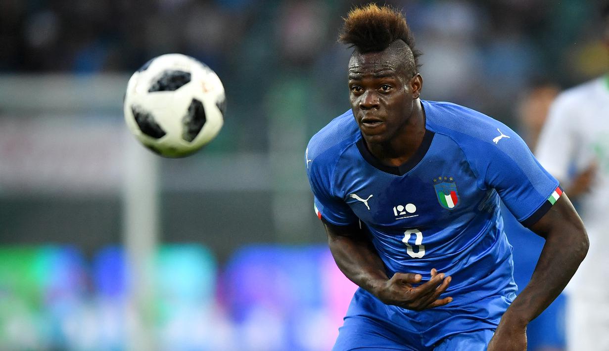 Selama memperkuat Timnas Italia sejak melakukan debut pada 10 Agustus 2010, Mario Balotelli telah bermain sebanyak 36 kali dengan torehan 14 gol dan 5 assist. (AFP/Fabrice Coffrini)