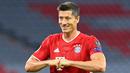 1. Robert Lewandowski (14 gol) - Lewandowski sangat produktif mencetak gol di Liga Champions musim ini. Tambahan satu gol ke gawang Barcelona pada perempat final membuat pemain asal Polandia ini kokoh di puncak top skor sementara Liga Champions. (AFP/Tobias Schwarz)