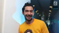 Pemain film Benyamin: Biang Kerok Reza Rahadian. (Liputan6.com/Fatkhur Rozaq)