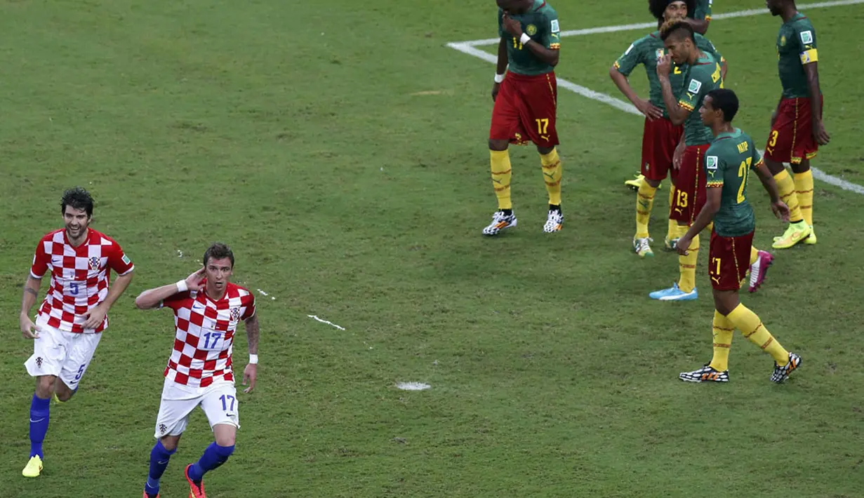 Timnas Kamerun dipastikan gagal lolos ke fase 16 besar Piala Dunia 2014 setelah kembali mengalami kekalahan saat berlaga kontra Kroasia 4-0 di Stadion Amazonia, Manaus, Brasil, (19/6/2014). (REUTERS/Andres Stapff)