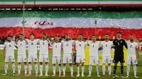1. Iran - Negara Timur Tengah ini menjadi wakil Asia pertama yang memastikan diri lolos ke Piala Dunia 2018. Tim asuhan Carlos Queiroz ini menjadi juara Grup A dengan unggul tujuh poin dari Korsel di posisi kedua. (AFP/Atta Kenare)	