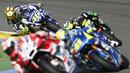 Valentino Rossi yang start paling belakang berusaha menyodok ke posisi depan dalam MotoGP Valencia di Sirkuit Ricardo Tormo, Valencia, Spanyol, (8/11/2015). (EPA/Kai Foersterling)