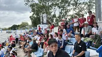 Penonton di IPE Chonburi Stadium, Chonburi, pada Minggu (14/12/2025) sore WIB, saat Timnas Indonesia Putri bersua Vietnam pada semifinal sepak bola putri SEA Games 2025. (Muhammad Adiyaksa/Bola.com)