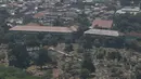 Suasana perkampungan padat penduduk di Jakarta, Kamis (30/8/2019). Direktur Konsolidasi Tanah Kementerian (ATR/BPN), Doni Widoantoro mengatakan dari hasil penelitian diperoleh fakta bahwa pemanfaatan tanah di DKI masih timpang. (Liputan6.com/Angga Yuniar)