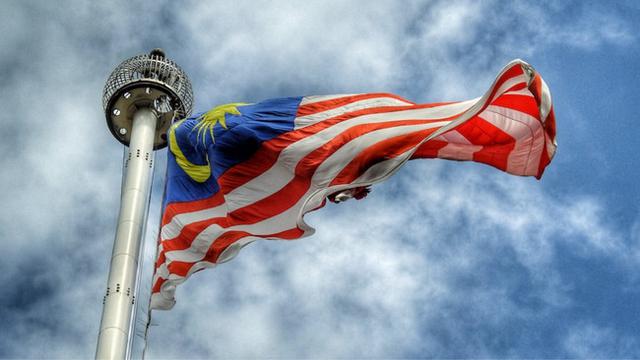 Ilustrasi bendera Malaysia. (Unsplash/mkjr_)