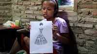 Viral, cerita Windi gadis disabilitas asal Pekalongan hasilkan desain gaun fantastis (Liputan6.Com/Fajar Eko Nugroho)