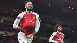 Olivier Giroud – Giroud merupakan striker yang memiliki finishing yang brilian. Selama berseragam Arsenal Giroud berhasil mengemas 69 gol dan 27 assists dalam 164 laga. (AFP/Ben Stansall)