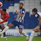 Striker Manchester United, Marcus Rashford, melepaskan tendangan ke arah gawang Brighton pada laga Premier League pekan ke-32 di Stadion Falmer, Rabu (1/7/2020) dini hari WIB. Manchester United menang 3-0 atas Brighton. (AFP/Mike Hewitt/pool)