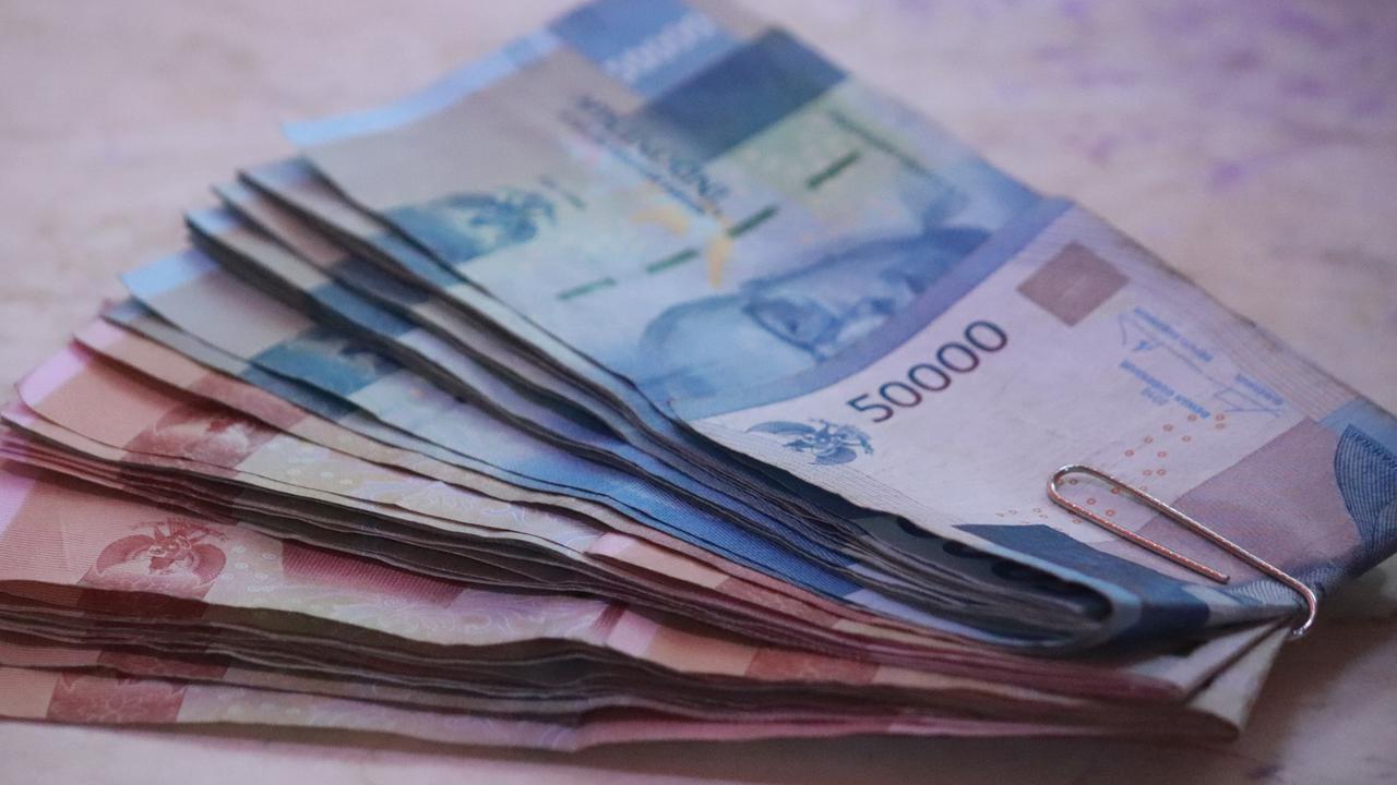 Viral Mencuci Uang Rupiah untuk Lebaran, Hati-Hati Bisa Kena Sanksi Rp1 Miliar