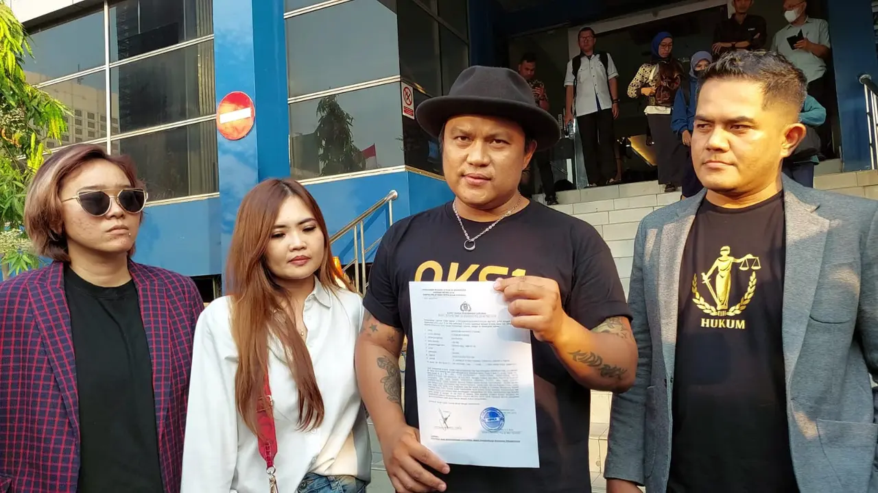 Posan Tobing melaporkan personel Grup Band Kotak atas dugaan pelanggaran hak cipta.