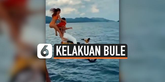 VIDEO: Viral Sepasang Bule Ceburkan Motor ke Laut Bali