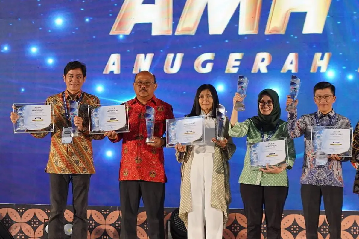 Dalam ajang Anugerah Media Humas (AMH) Tahun 2022, Kemenko Perekonomian meraih Predikat Terbaik I untuk kategori Media Audio Visual. (Dok ekon.go.id)