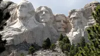 Theodore Roosevelt termasuk satu dari empat Presiden Amerika Serikat yang wajahnya diabadikan dalam bentuk pahatan di dinding Mount Rushmore. (AFP/Scott Olson)