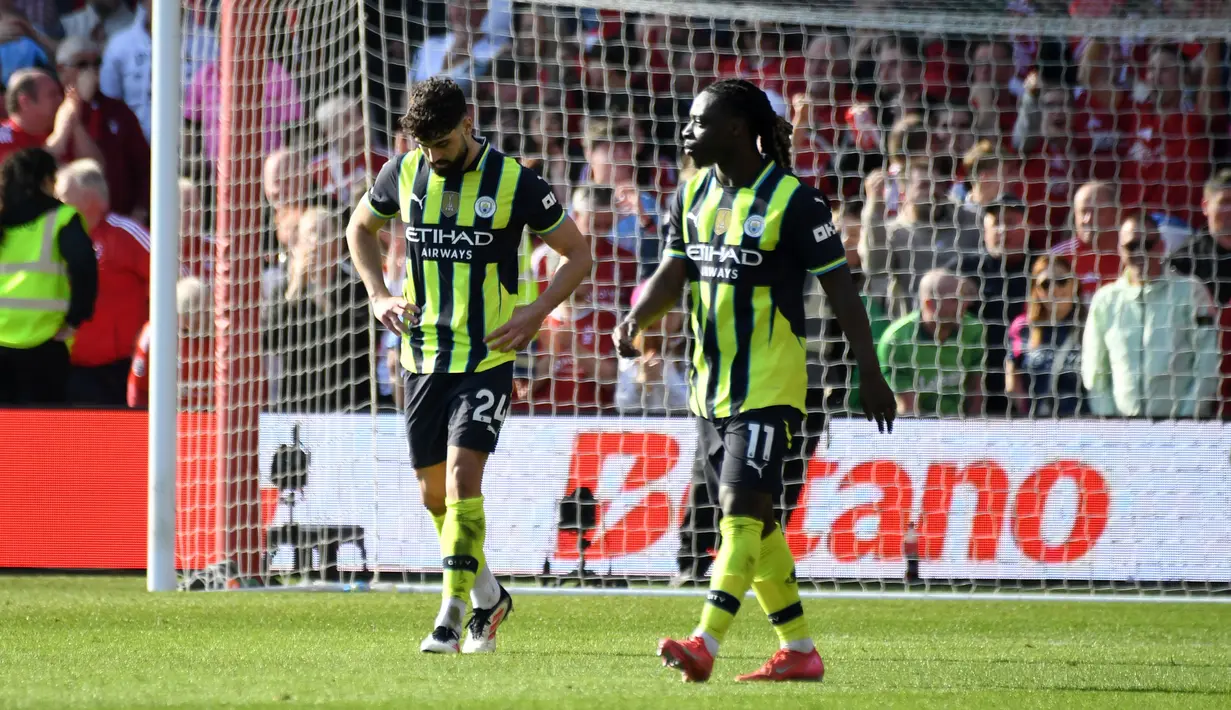 Manchester City harus menelan pil pahit kala bertandang ke markas Nottingham Forest dalam laga pekan ke-28 Premier League 2024/2025 di City Ground, Sabtu (8/3/2025) malam WIB. (AP Photo/Rui Vieira)