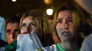 Rakyat Aljazair ikut menyaksikan pertandingan antara Aljazair vs Jerman dinegaranya (AFP PHOTO/FAROUK BATICHE)