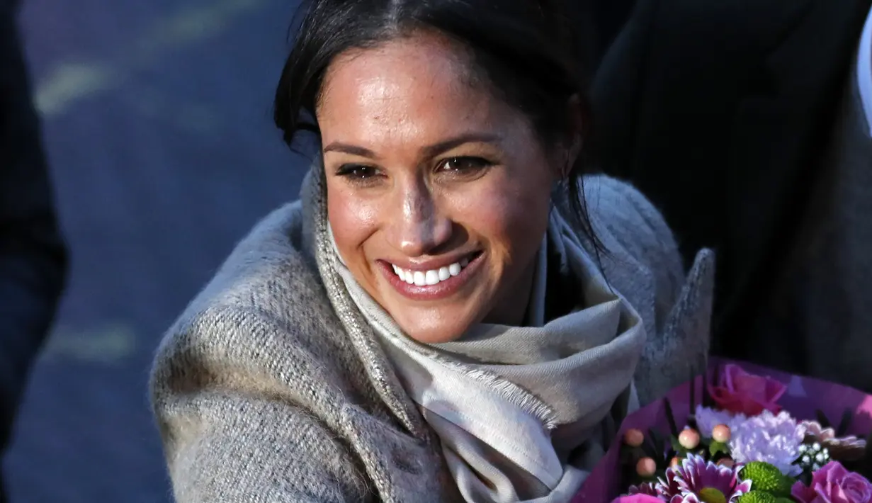 Meghan Markle ternyata miliki darah kulit hitam. Ibunya adalah seorang Afrika-Amerika dan ayahnya keturunan Belanda-Irlandia. (Adrian Dennis / AFP)