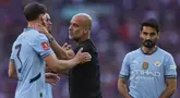 Ekspresi kecewa pelatih Manchester City, Pep Guardiola bersama para pemainnya setelah kalah dari Crystal Palace dalam laga final Piala FA 2024/2025 yang berlangsung di Stadion Wembley, London, Inggris, Sabtu (17/05/2025) waktu setempat. (AP Photo/Ian Walton)