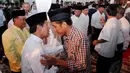 Tiba di lokasi, mantan Wali Kota Solo itu disambut Ketum PKPI Sutiyoso di DPP Partai Nasdem, Jakarta, Senin (30/6/14). (Liputan6.com/Andrian M Tunay)