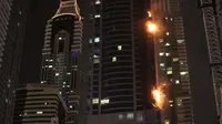 Kebakaran Menara Torch di Dubai. (Karim Sahib/Agence France-Presse)