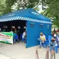 Salah satu lokasi vaksinasi gratis bagi warga yang disiapkan Polres Palu di Taman GOR Palu, Jumat (4/6/2021). Untuk mendukung vaksinasi gratis Polres Palu juga membuka layanan serupa di polsek-polsek. (Foto: Heri Susanto/ Liputan6.com).