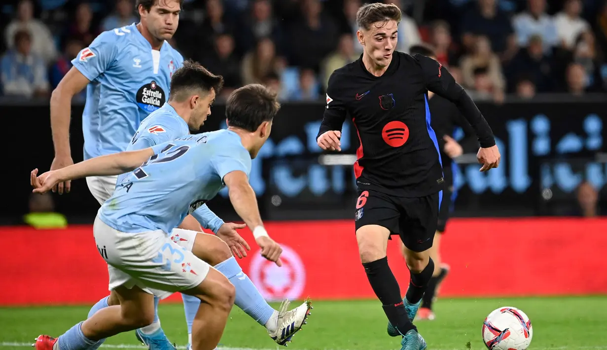 Hingga akhir babak pertama, Barcelona masih unggul 1-0 atas tuan rumah Celta Vigo. (MIGUEL RIOPA/AFP)