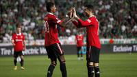 Alhasil, Cristiano Ronaldo harus puas dengan torehan 1 assistnya pada laga melawan Omonia Nicosia. Assistnya tercipta untuk gol Marcus Rashford yang menjadi gol ketiga MU dalam laga tersebut. (AP/Maria Karadjias)
