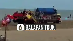 Tidak lama balapan itu berlangsung, salah satu truk mengalami oleng dan akhirnya terguling.