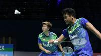 Tontowi Ahmad/Liliyana Natsir mengalahkan Chris Adcock/Gabrielle Adcock skor 21-18, 18-21, 21-14 pada laga perdana BWF Super Series Finals 2017, Rabu (13/12/2017). (PBSI)