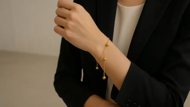 Model Gelang Emas Elegan 2 Gram dengan Bola Kecil Tren 2025/ Ilustrasi oleh AI