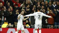 Real Madrid berhasil mendapatkan tiket lolos ke babak 16 besar Liga Champions usai menundukkan PSG 1-0. (uefa.com)