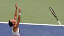 Ekspresi petenis Italia, Flavia Pennetta, setelah menjuarai Tenis AS Terbuka 2015 di New York, AS. (13/9/2015). (AFP Photo/Jewel Samad)