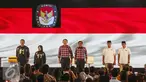 (ki-ka) Cagub DKI Jakarta no 1 Agus Harimurti Yudhoyono-Sylviana, no 2 Basuki T Purnama-Djarot Saiful Hidayat, dan no 3 Anies Baswedan-Sandiaga Uno menyanyikan lagu Indonesia Raya sebelum debat kedua Cagub, Jumat (27/1). (Liputan6.com/Faizal Fanani)