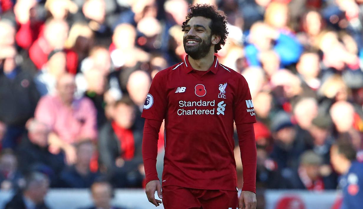 Salah baru-baru ini juga meraih gelar pemain terbaik afrika. Dengan penampilannya saat ini Mohamed Salah akan dibandrol 250 juta pound jika ada klub yang nekat ingin mendapatakan jasa pemain 26 tahun tersebut. (AFP/Geoff Caddick)