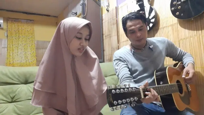 Kharisma Bella Amalia dan Anwar Powerslaves