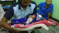 Bayi Andrian tertahan 48 hari karena orang tua kesulitan biaya (Liputan6.com / Zainul Arifin)
