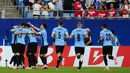 Selebrasi para pemain Timnas Uruguay merayakan gol pertama ke gawang Timnas Kanada yang dicetak Rodrigo Bentancur pada laga perebutan tempat ketiga Copa America 2024 di Bank of America Stadium, Charlotte, Amerika Serikat, Minggu (14/7/2024) pagi WIB. (AP Photo/Jacob Kupferman)