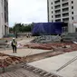 Suasana proyek Apartemen Pakubuwono Spring 3 di Jalan Teuku Cut Nyak Arief, Kebayoran Lama, jakarta Selatan, Rabu (27/12). Tiga orang tewas akibat robohnya bangunan Apartemen Pakubuwono Spring 3. (Liputan6.com/JohanTallo)