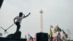 Penampilan Ari Lasso saat Konser Drug Free Asia Afrika di Kawasan Monas, Jakarta, Minggu (19/4/2015). Konser dalam rangkaian KAA itu bertujuan sebagai kampanye pencegahan penyalahgunaan narkotika di kawasan Asia Afrika. (Liputan6.com/Faizal Fanani)