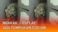 Momen kocak terekam kamera, diduga terjadi di sebuah pesantren. Tumpukan kain di atas ember disiram air gayung. Tiba-tiba muncul sosok santri di balik kain sarung.
