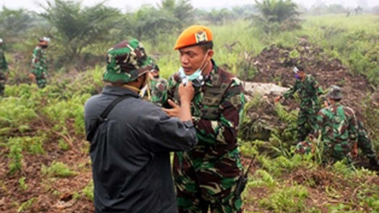 Aksi Paskhas atasi kabut asap di Pekanbaru