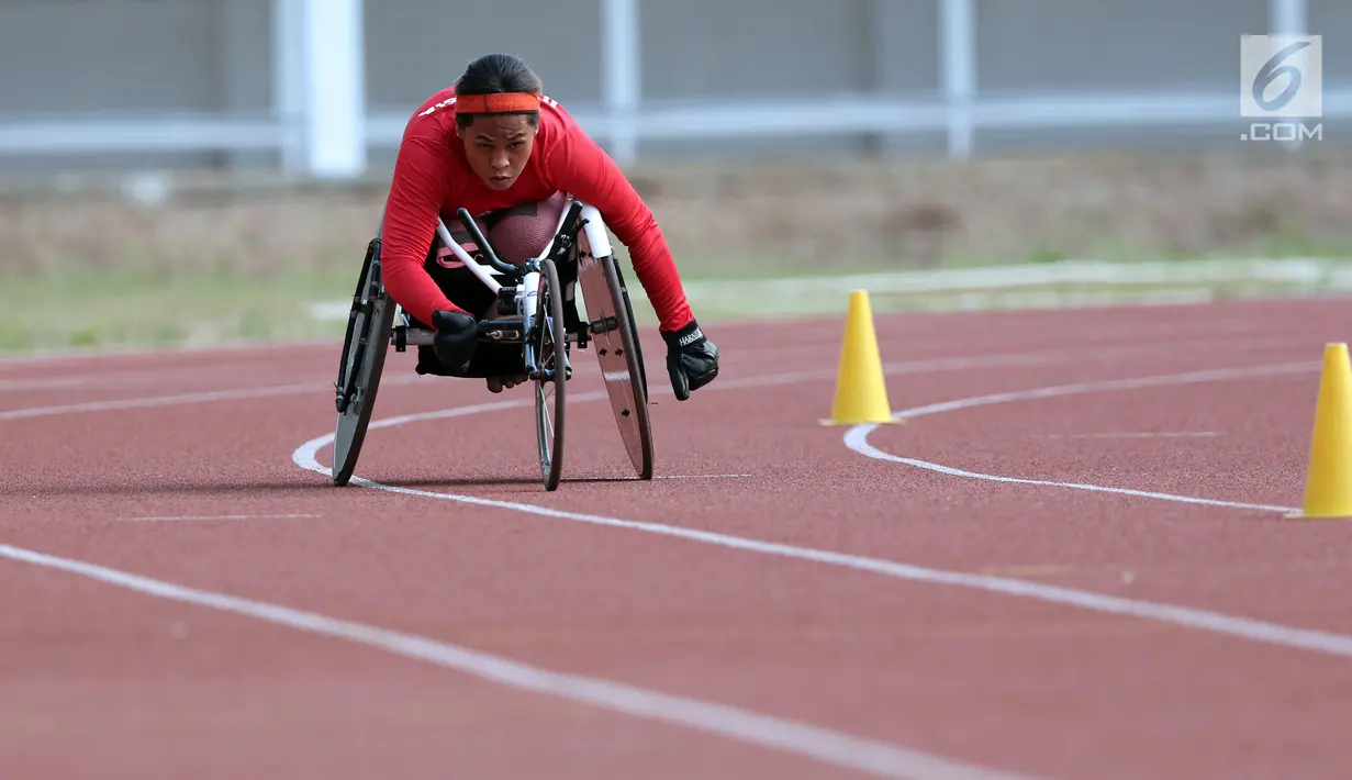 Atlet WheelChair Racing Asian Para Games 2018 dari Indonesia saat latihan di Stadion Madya, Kompleks GBK, Jakarta, Kamis (4/10). Asian Para Games 2018 berlangsung di Jakarta, 6-13 Oktober. (Liputan6.com/Helmi Fithriansyah)