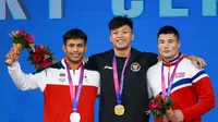 Rahmat Erwin Abdullah meraih medali emas Asian Games 2022 nomor Men's 73 kg. (NOC/Naif Al'as)