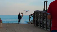 Gara-gara drone jatuh menimpa tamu di sebuah pernikahan, pengantin pria digugat oleh tamu tersebut. (Sumber: CNET)